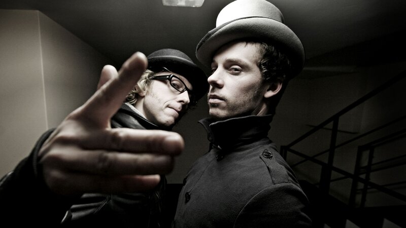 two men in hats posing