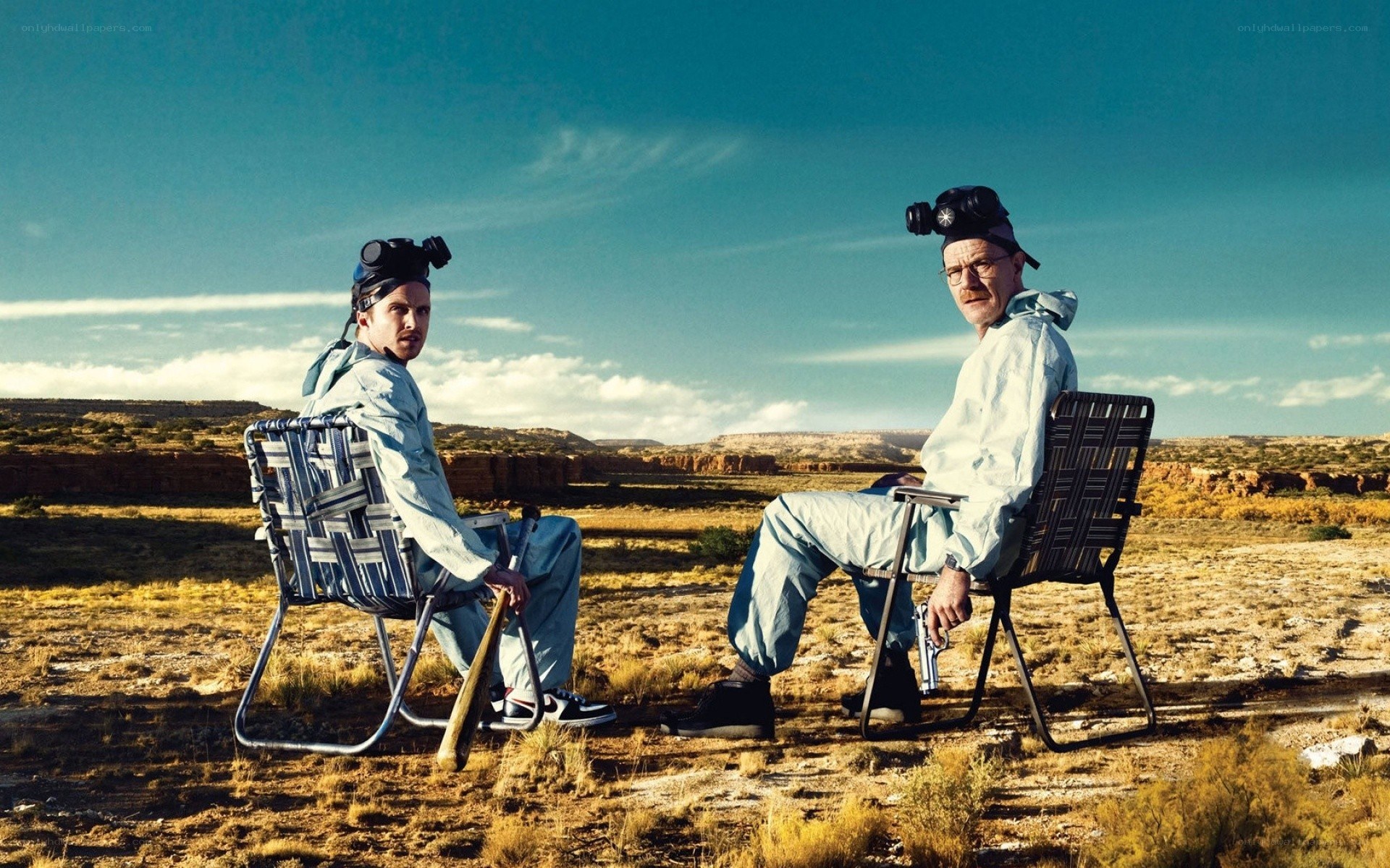 Two men in hazmat suits