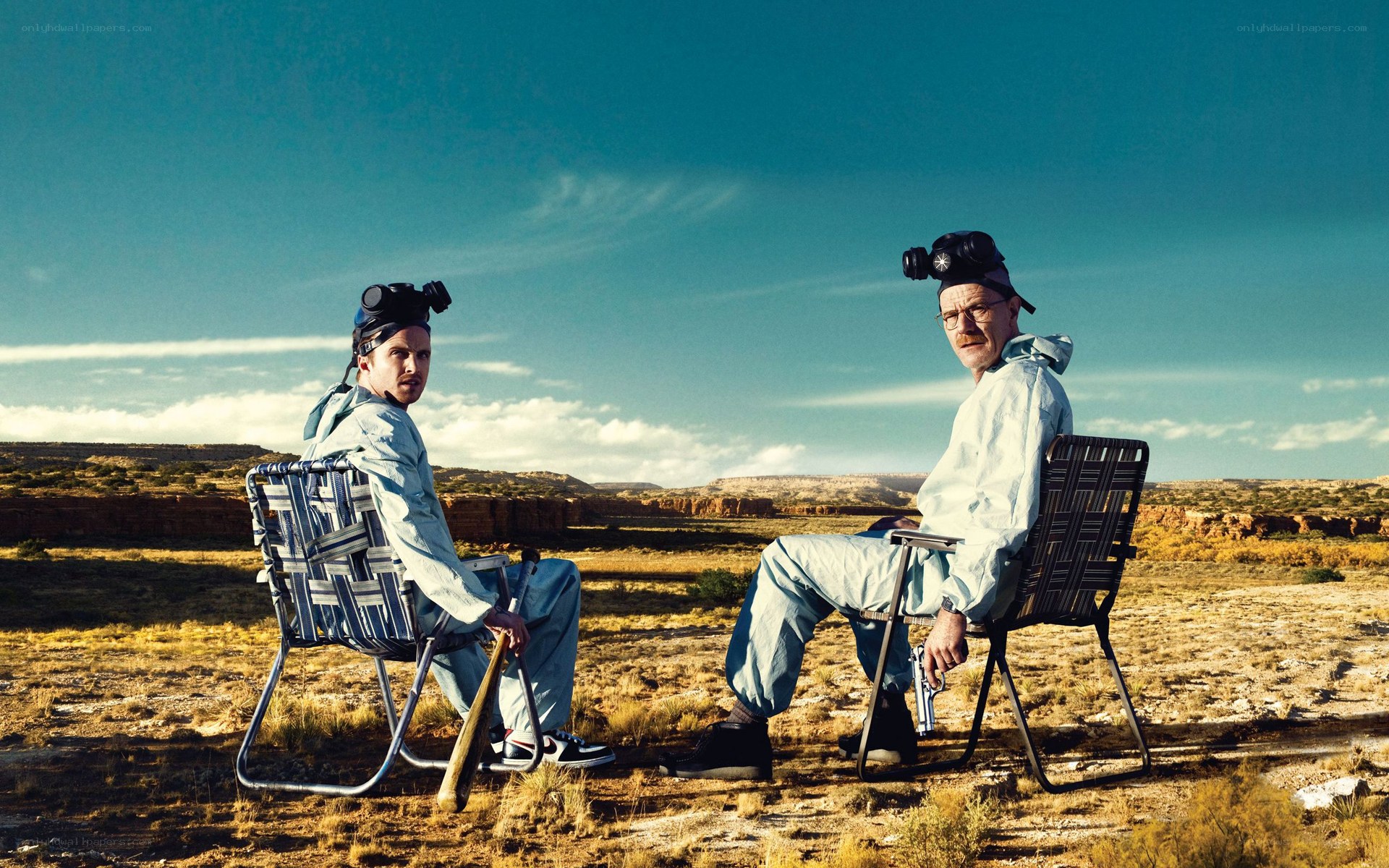 Two men in hazmat suits