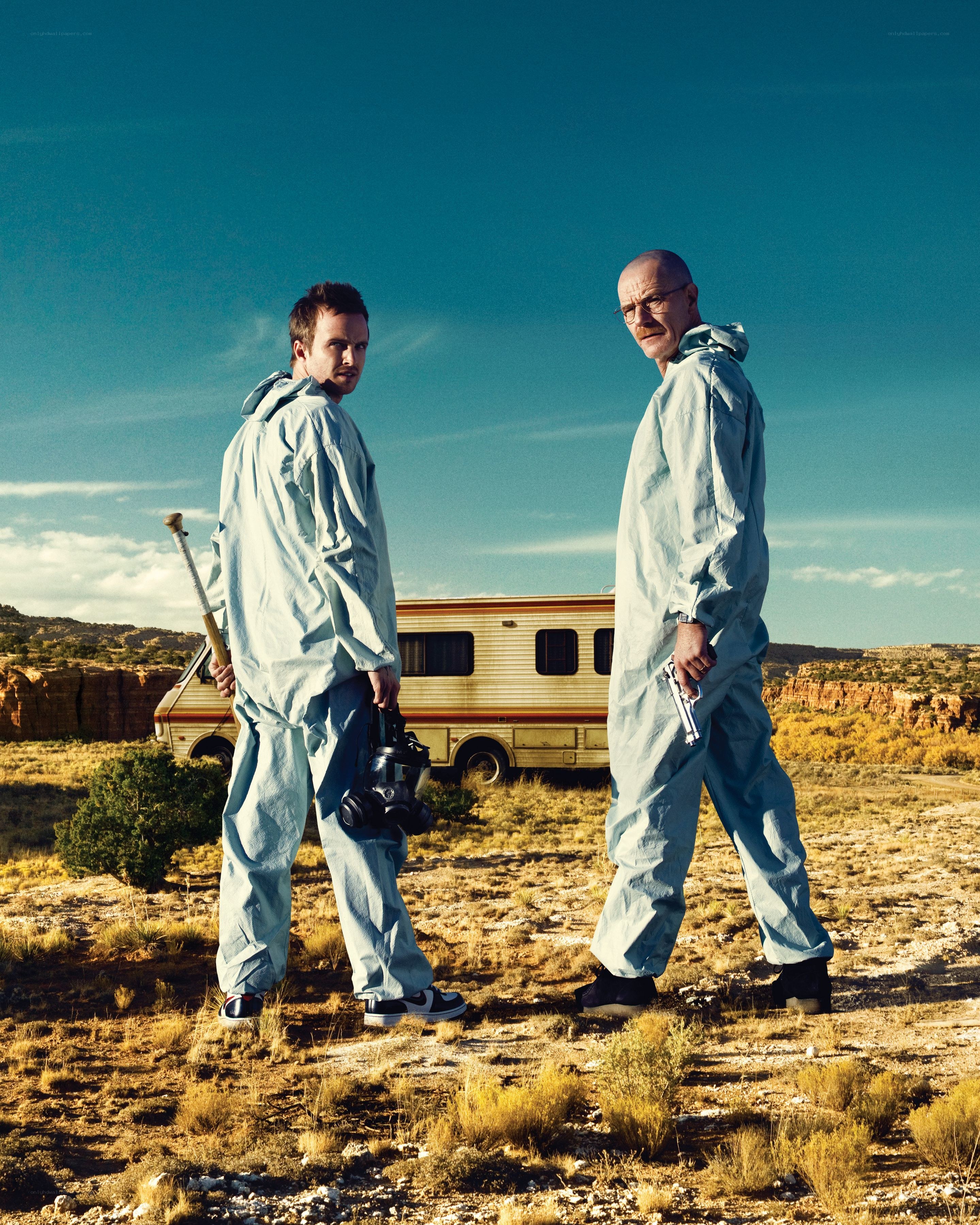 Two men in hazmat suits