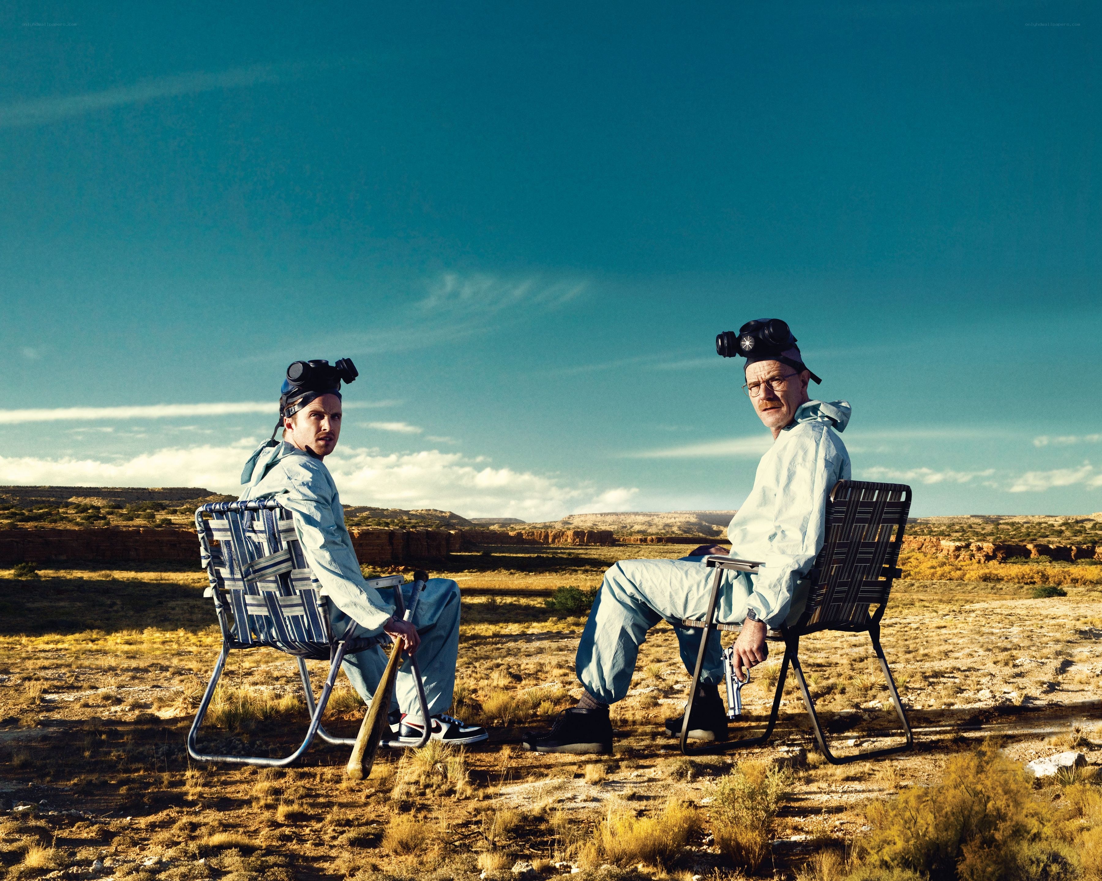 Two men in hazmat suits