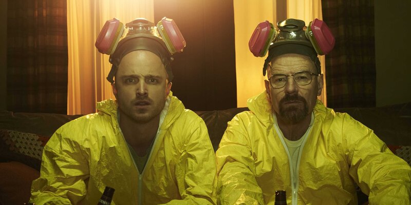Two men in hazmat suits