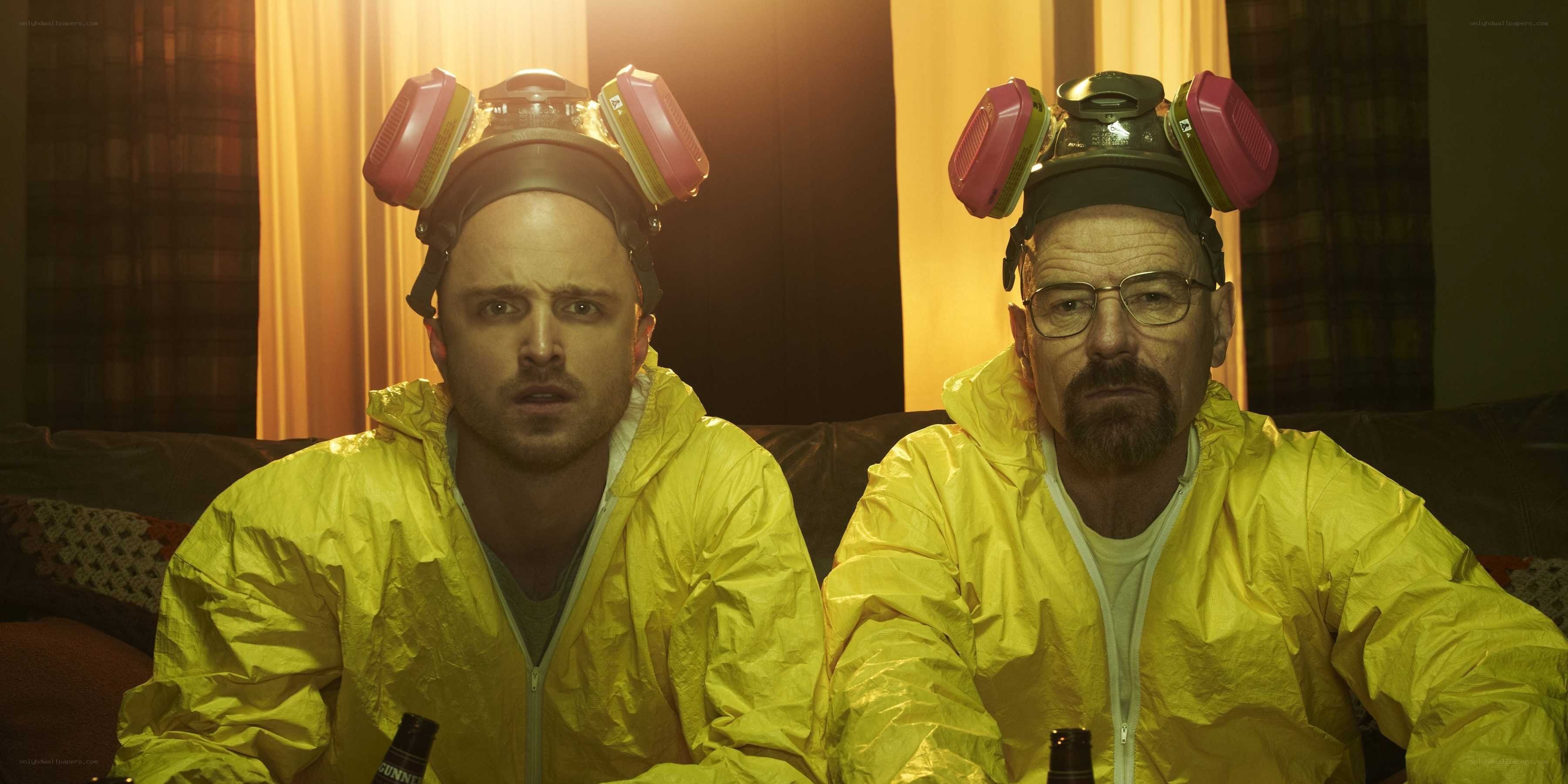 Two men in hazmat suits
