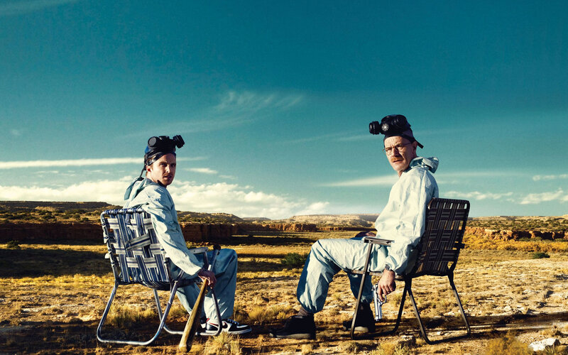 Two men in hazmat suits