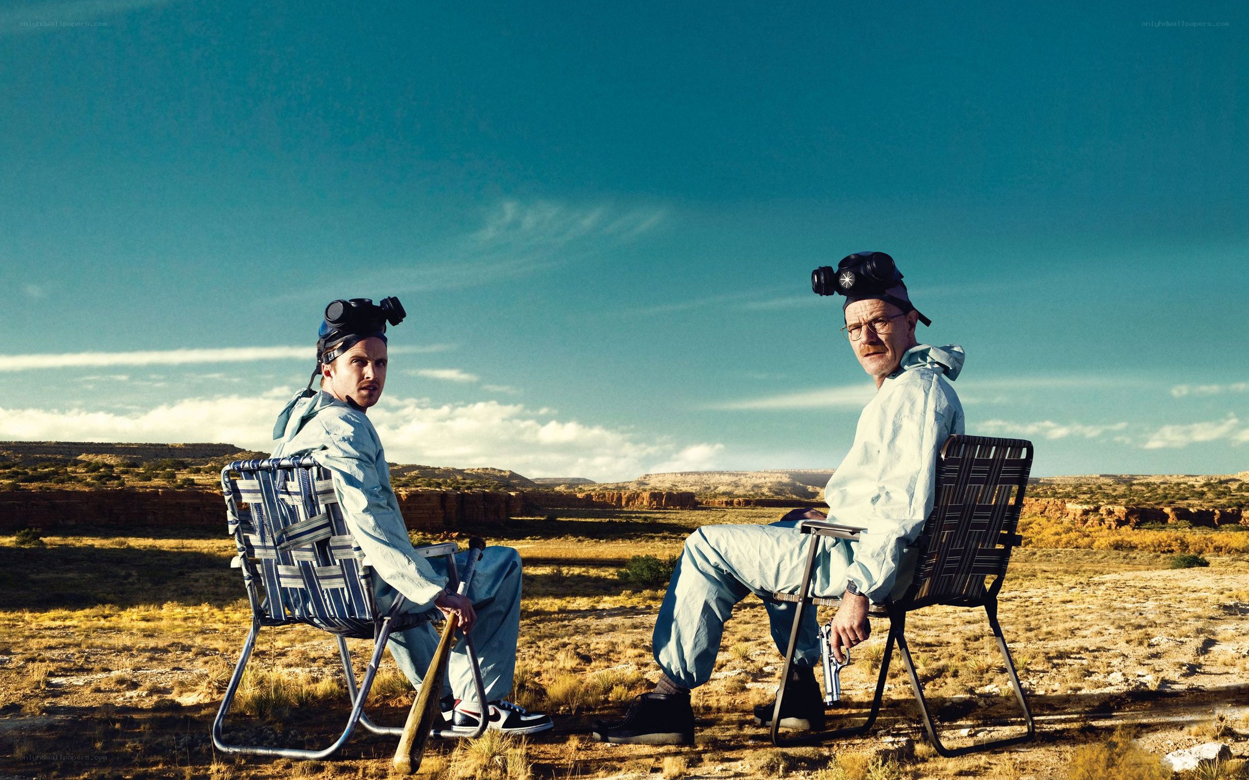 Two men in hazmat suits