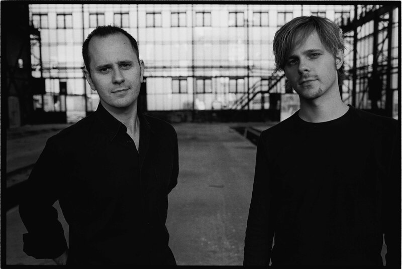 two men in industrial setting