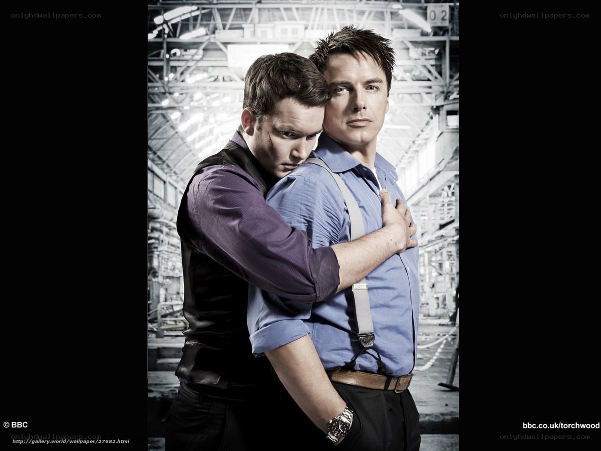 Two men in industrial setting