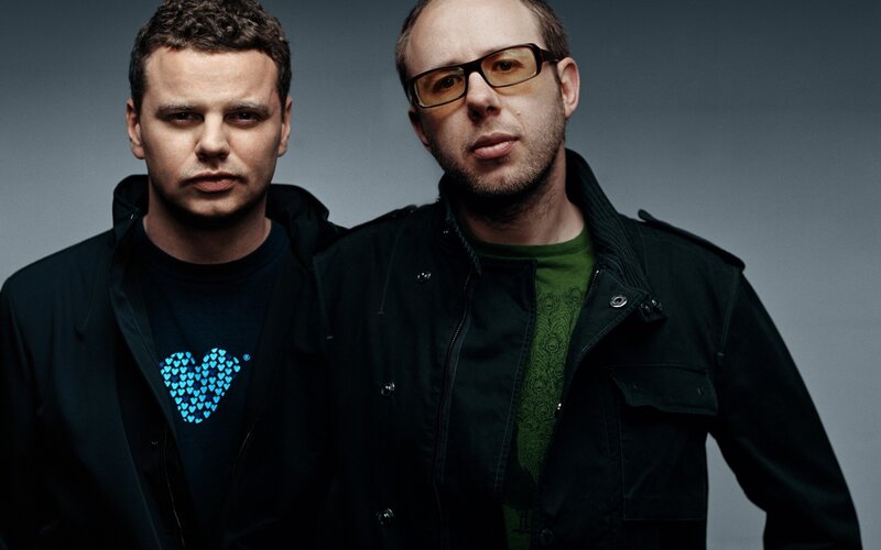 Two Men in Jackets — Black, Serious