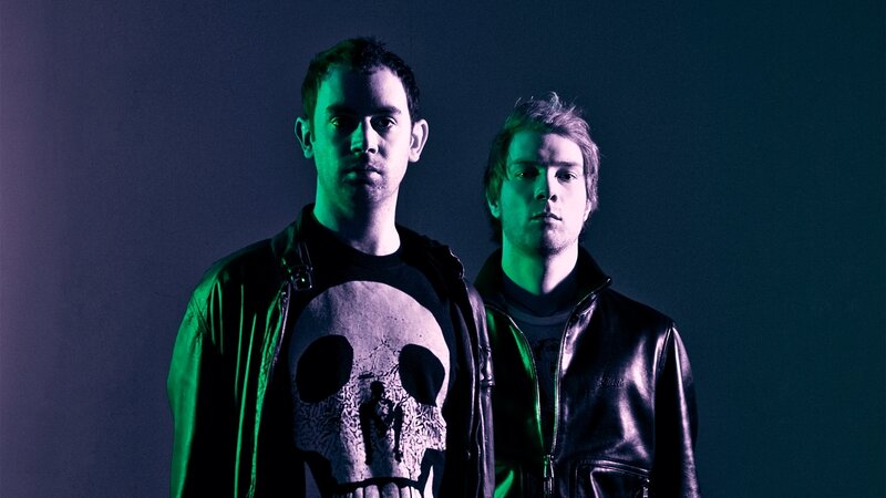 two men in leather jackets