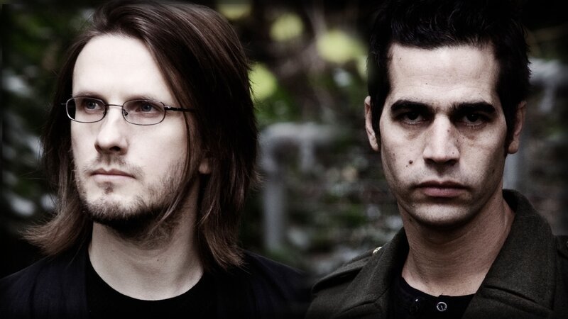 two men in outdoor setting