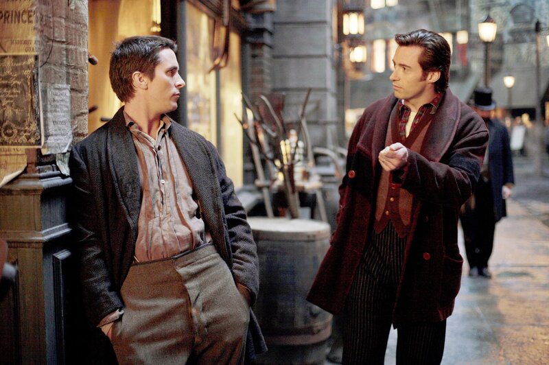 Two men in period clothing talking