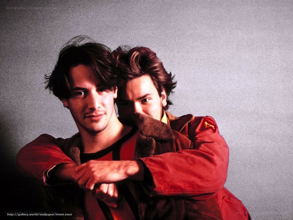 two men in red jackets