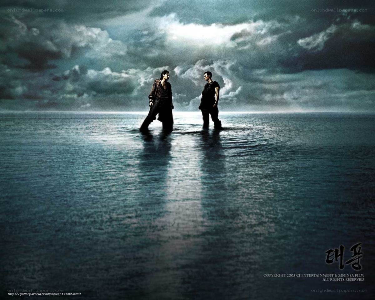 Two men in shallow water