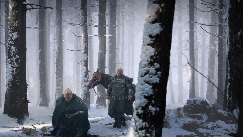 Two Men in Snowy Forest