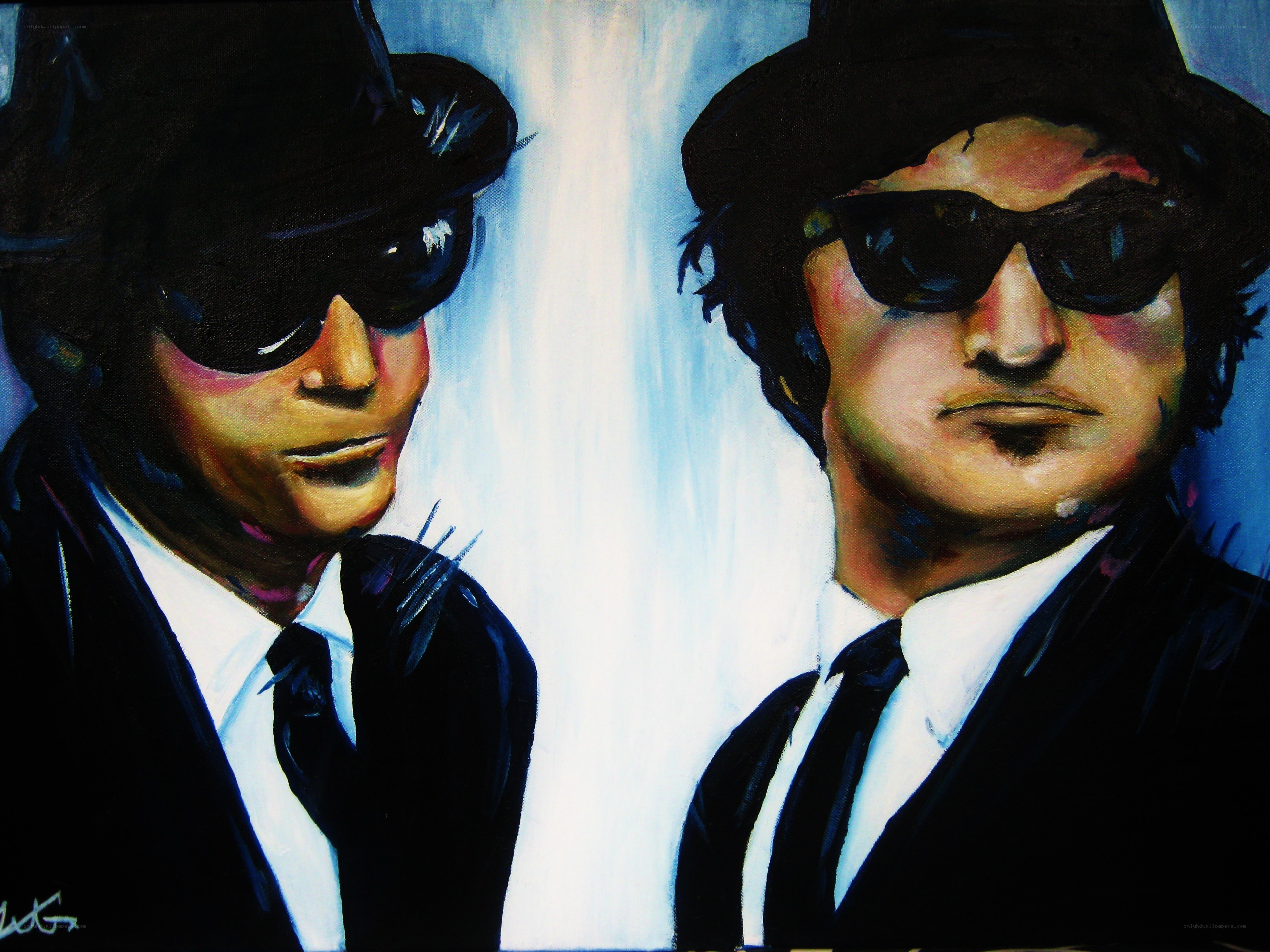 Two men in suits and hats