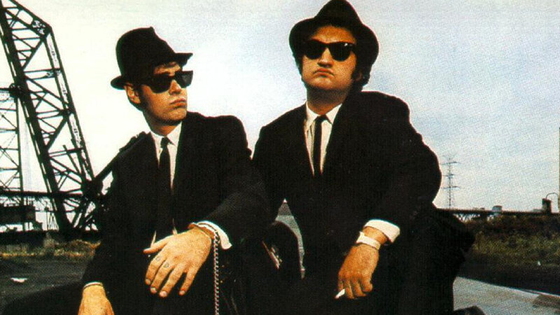 Two Men in Suits — Black, Serious, Photograph, Hats