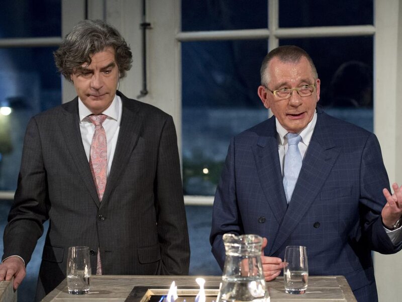 Two Men in Suits — Blue, Serious, Night