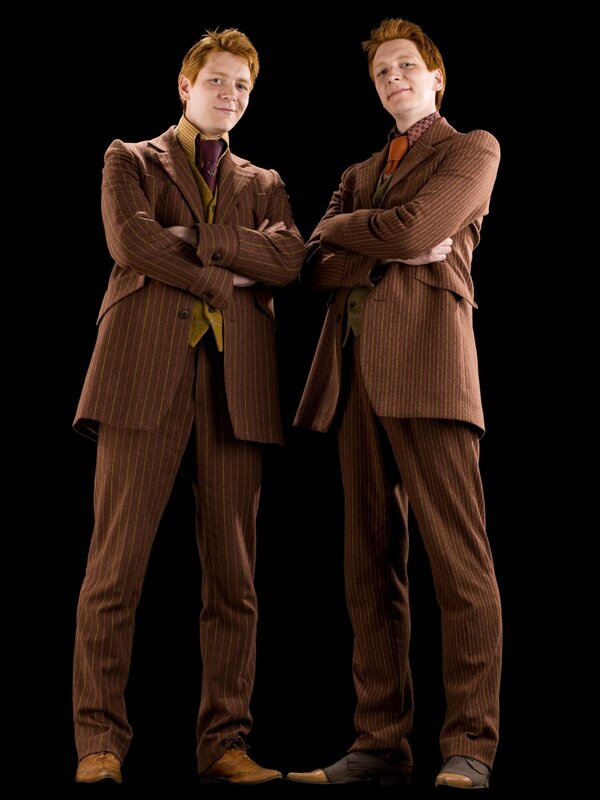 Two Men in Suits — Brown, Confident