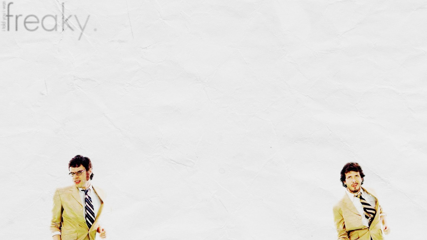 two men in suits on white background