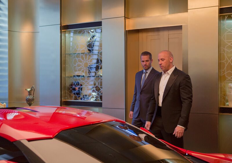 Two Men in Suits — Red, Serious