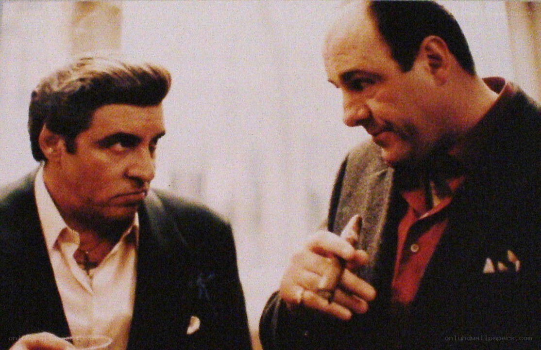 two men in suits talking