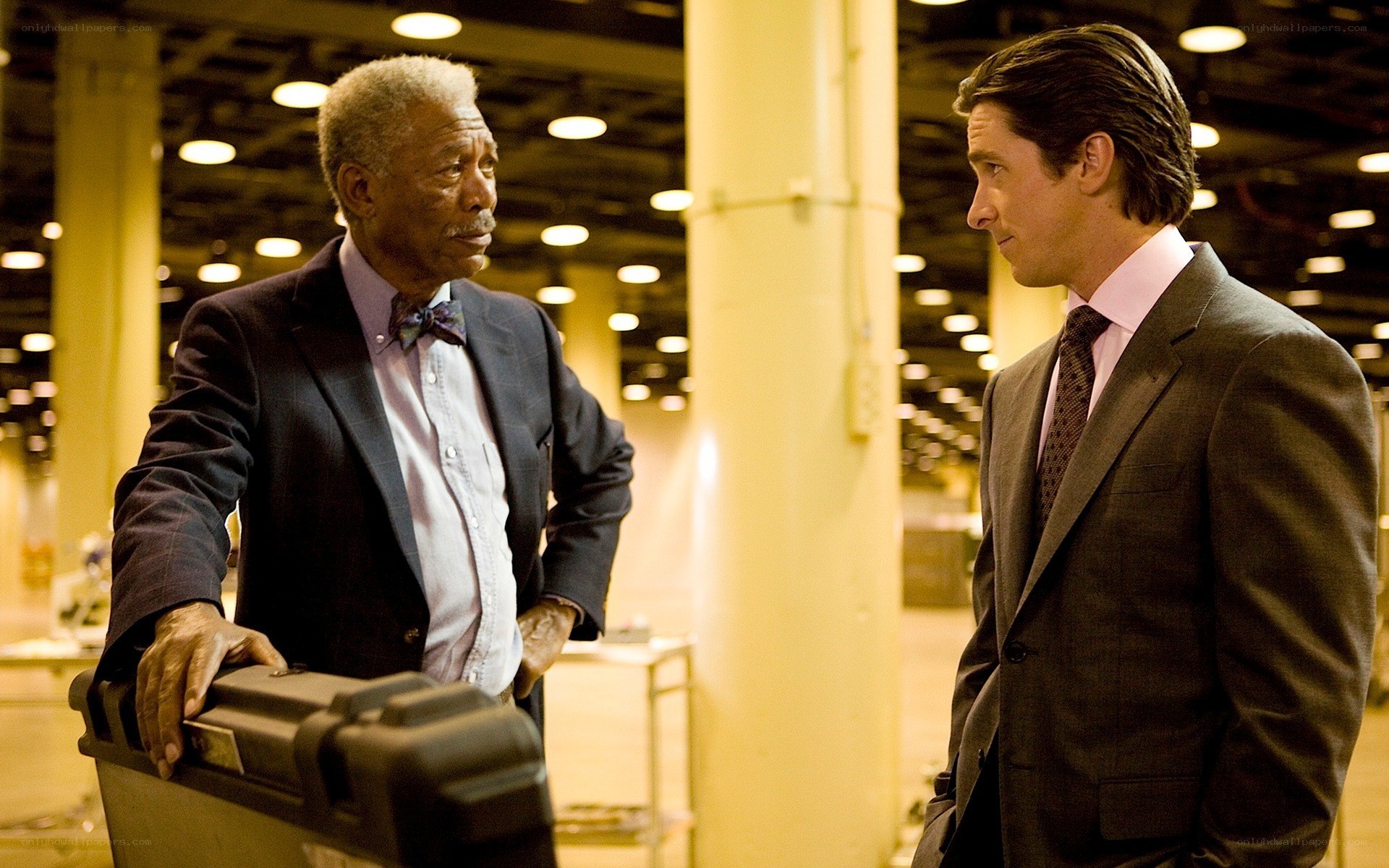 two men in suits talking