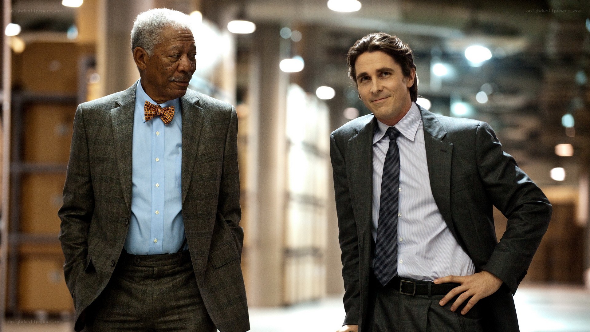 two men in suits walking