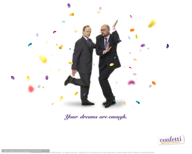Two men in suits with confetti