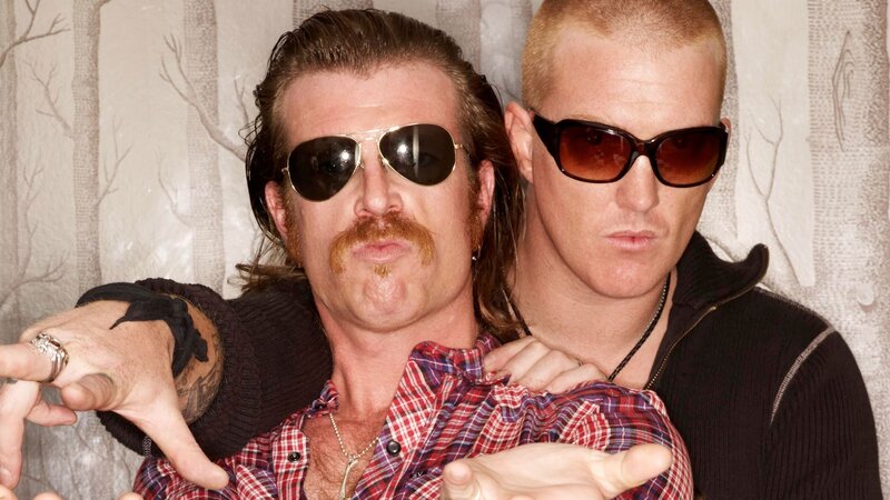 Two men in sunglasses posing