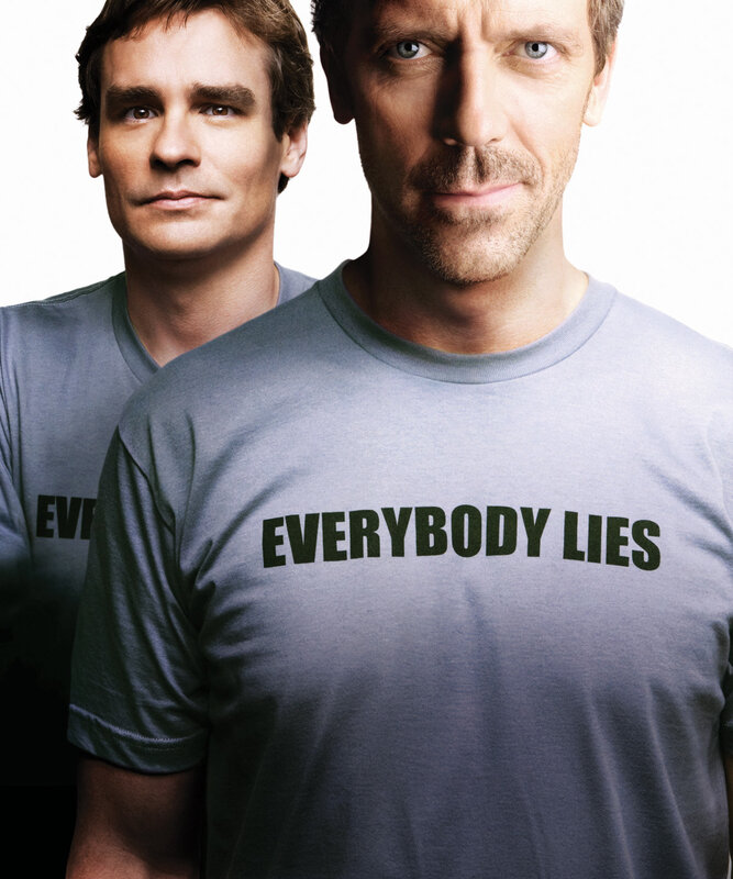 Two men in t-shirts with text