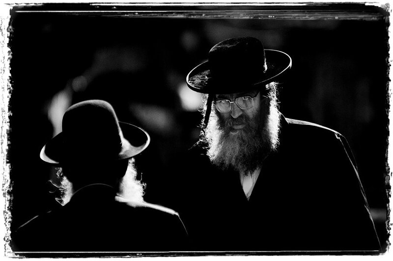 Two men in traditional Jewish attire