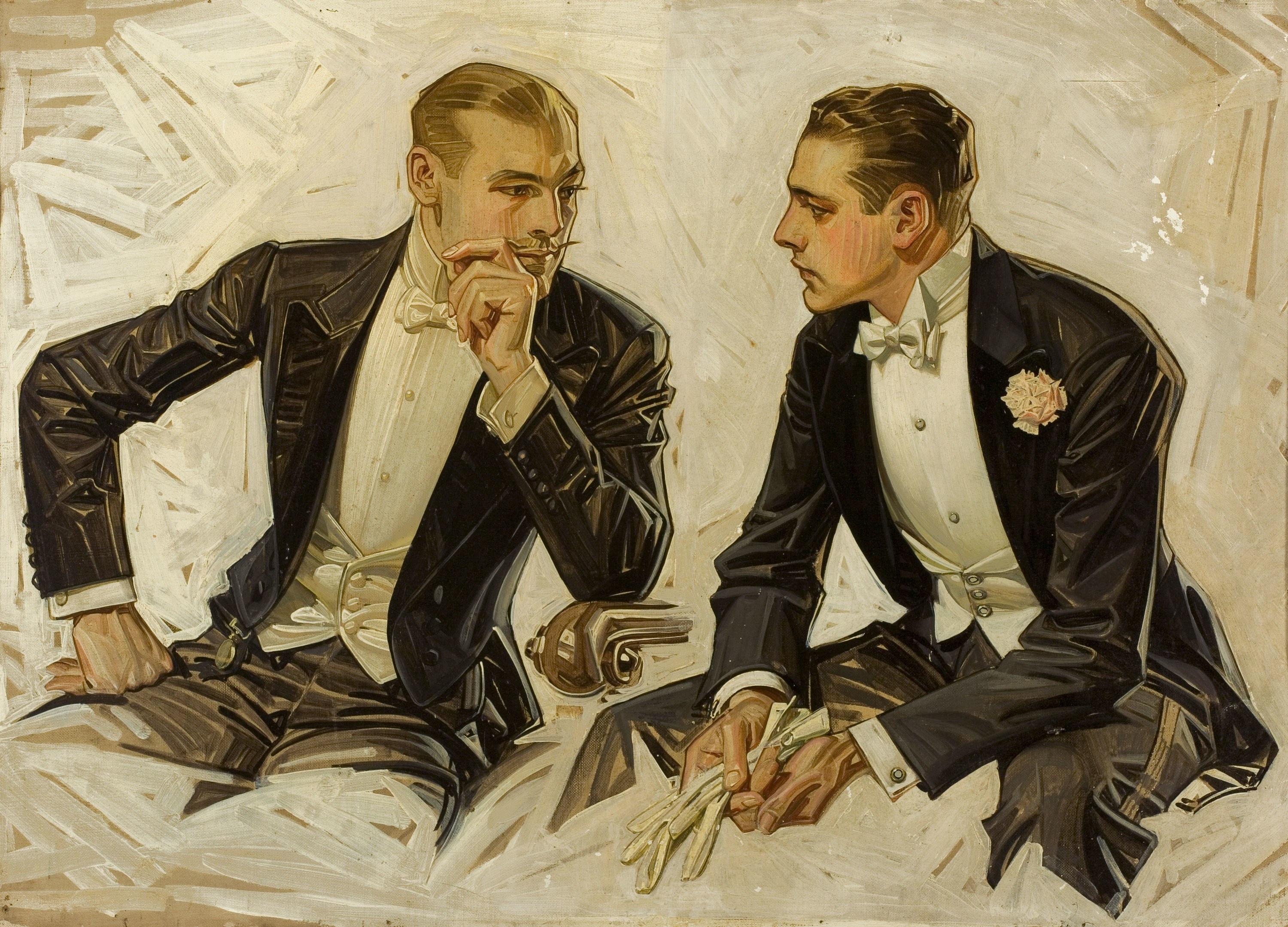 Two men in tuxedos conversing