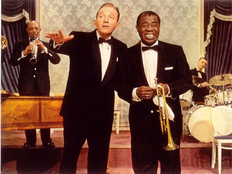Two Men in Tuxedos on Stage