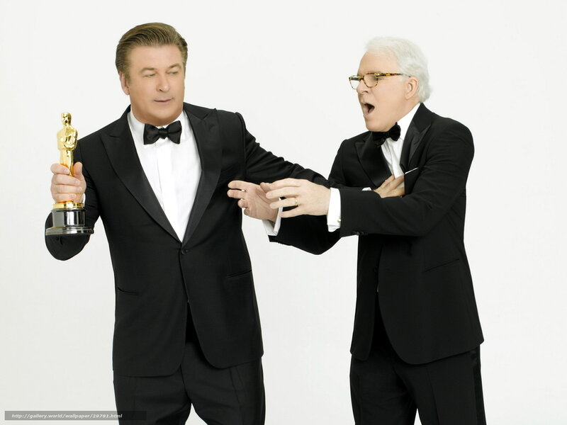 Two men in tuxedos with Oscar