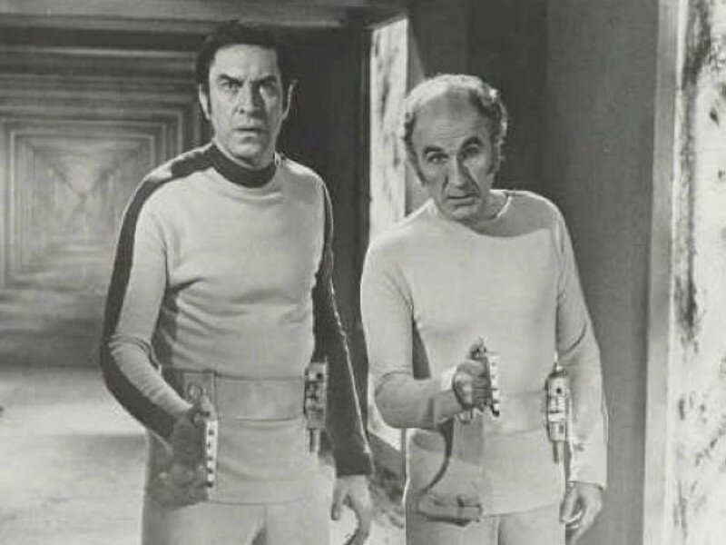 Two Men in Uniforms — Black