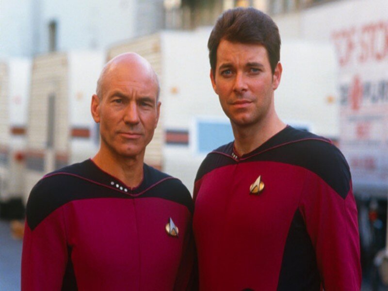 Two Men in Uniforms — Red