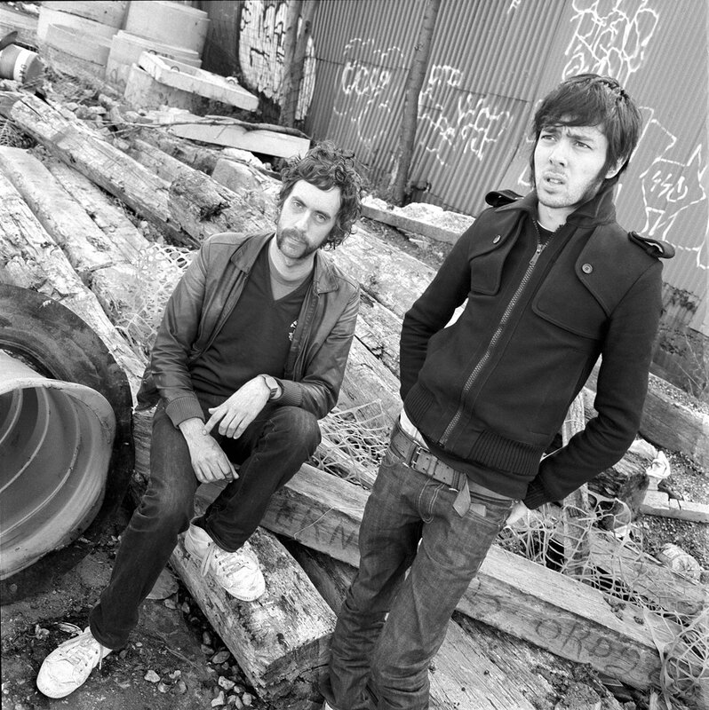 two men in urban setting