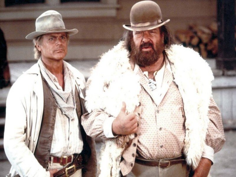 Two Men in Western Attire — Brown, Serious