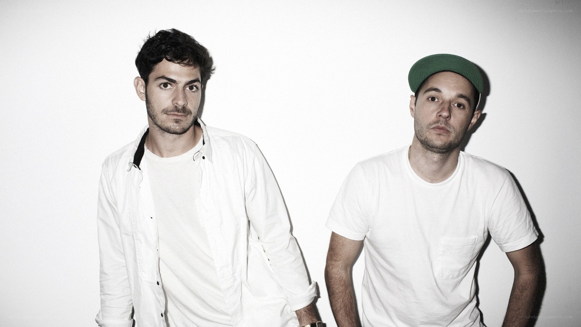 two men in white clothing