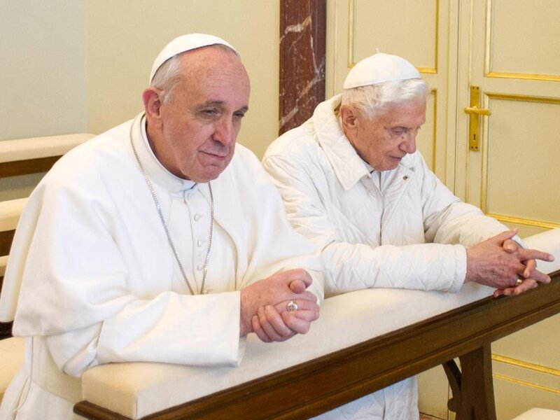 Two Men in White Robes — Solemn