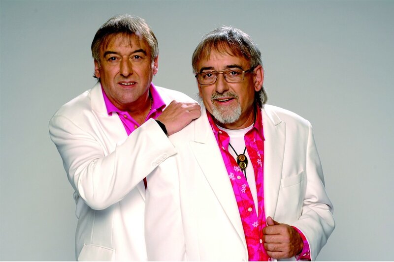 Two men in white suits