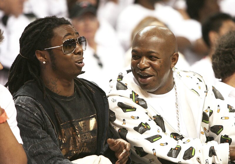 Two men laughing at event