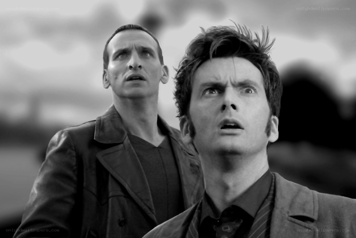 Two men look up in shock