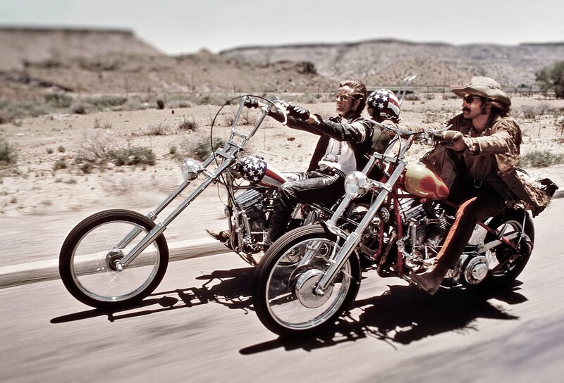 Two Men on Chopper Motorcycles — Brown