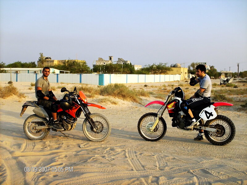 Two men on dirt bikes