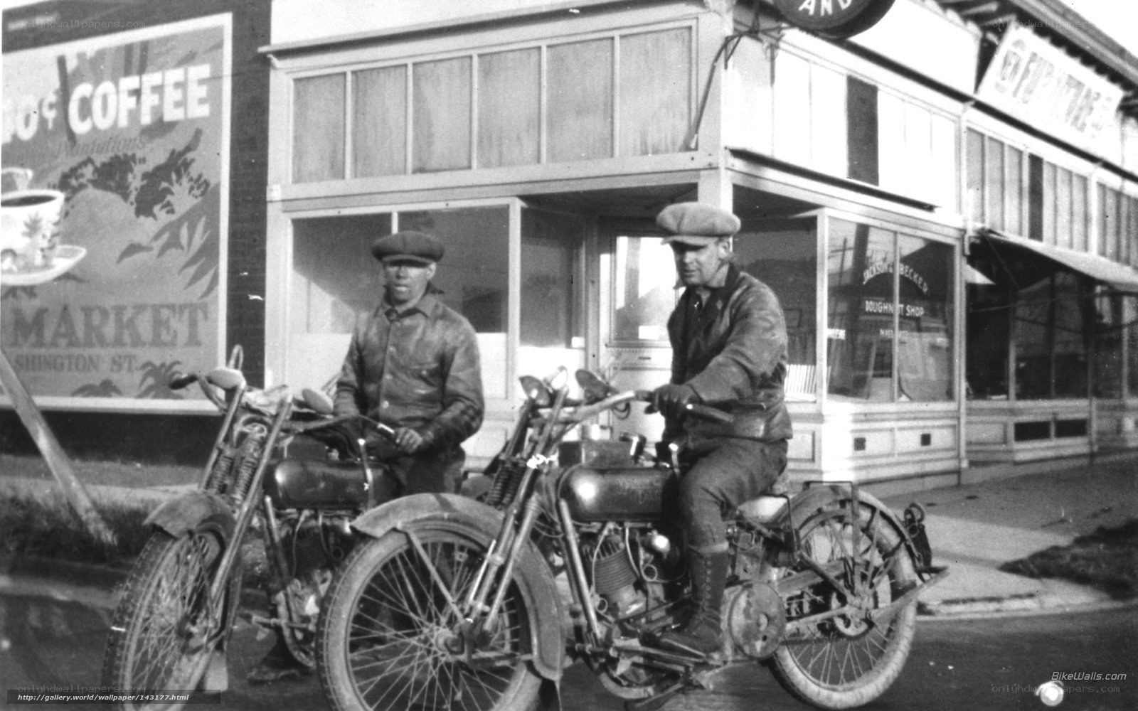 Two men on vintage motorcycles