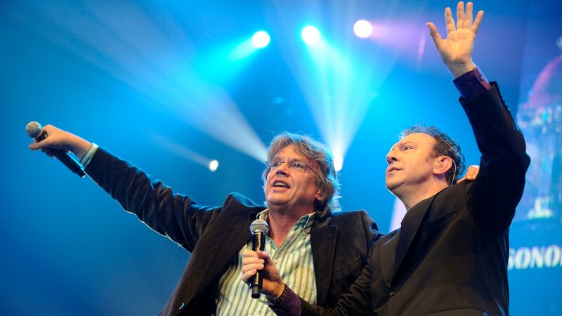 Two men performing on stage