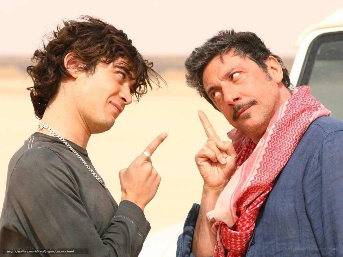 Two men pointing at each other