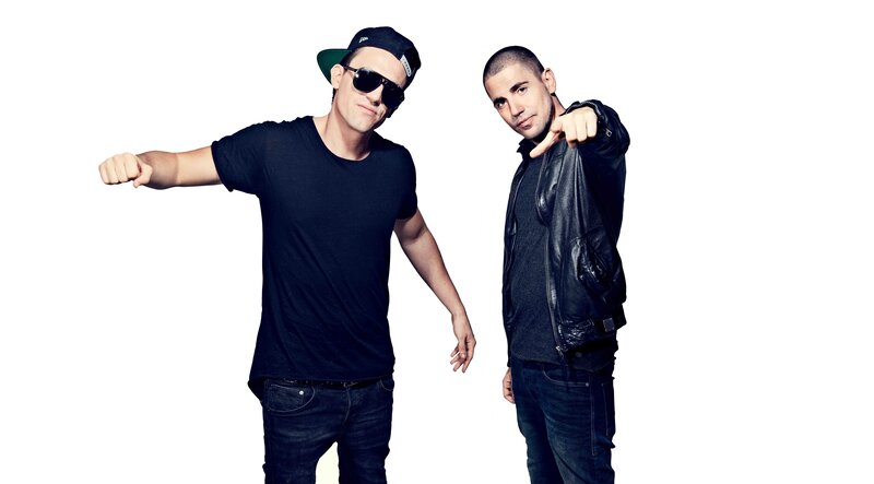 two men posing confidently