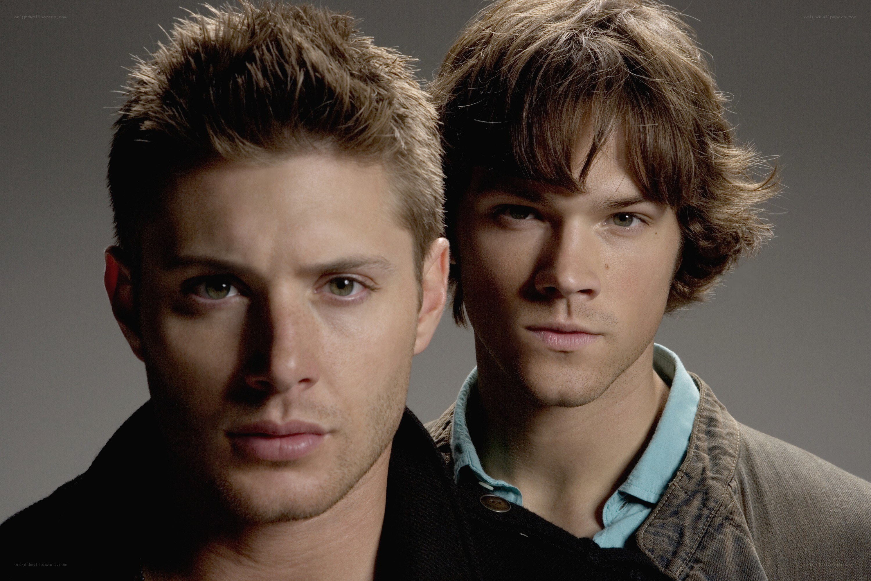 two men posing for a portrait